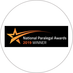 An award sticker showing PM Property Lawyers achieving the "National Paralegal Awards 2019 Winner" title