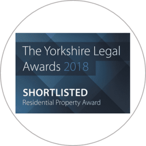 An award sticker showing PM Property Lawyers being shortlisted for the "Residential Property Award" title for the Yorkshire Legal Awards 2018.