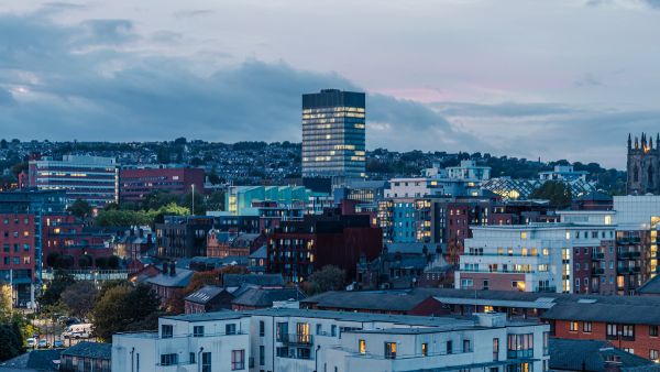 An aerial view of Sheffield city centre at night.