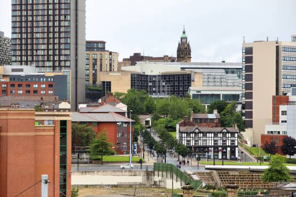 An image overlooking Sheffield town centre on a cloudy day.