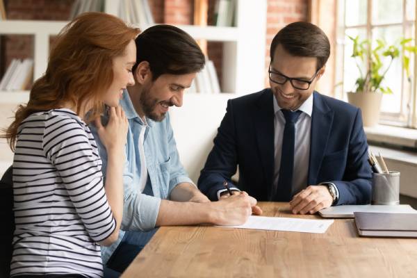 The Register of Overseas Entities Consultation A young couple consult with a solicitor about The Register of Overseas Entities.